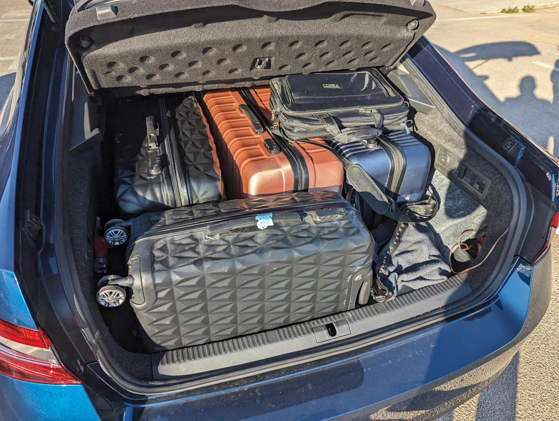 Comfortable Škoda Superb interior with luggage, ready for a Skradin transfer